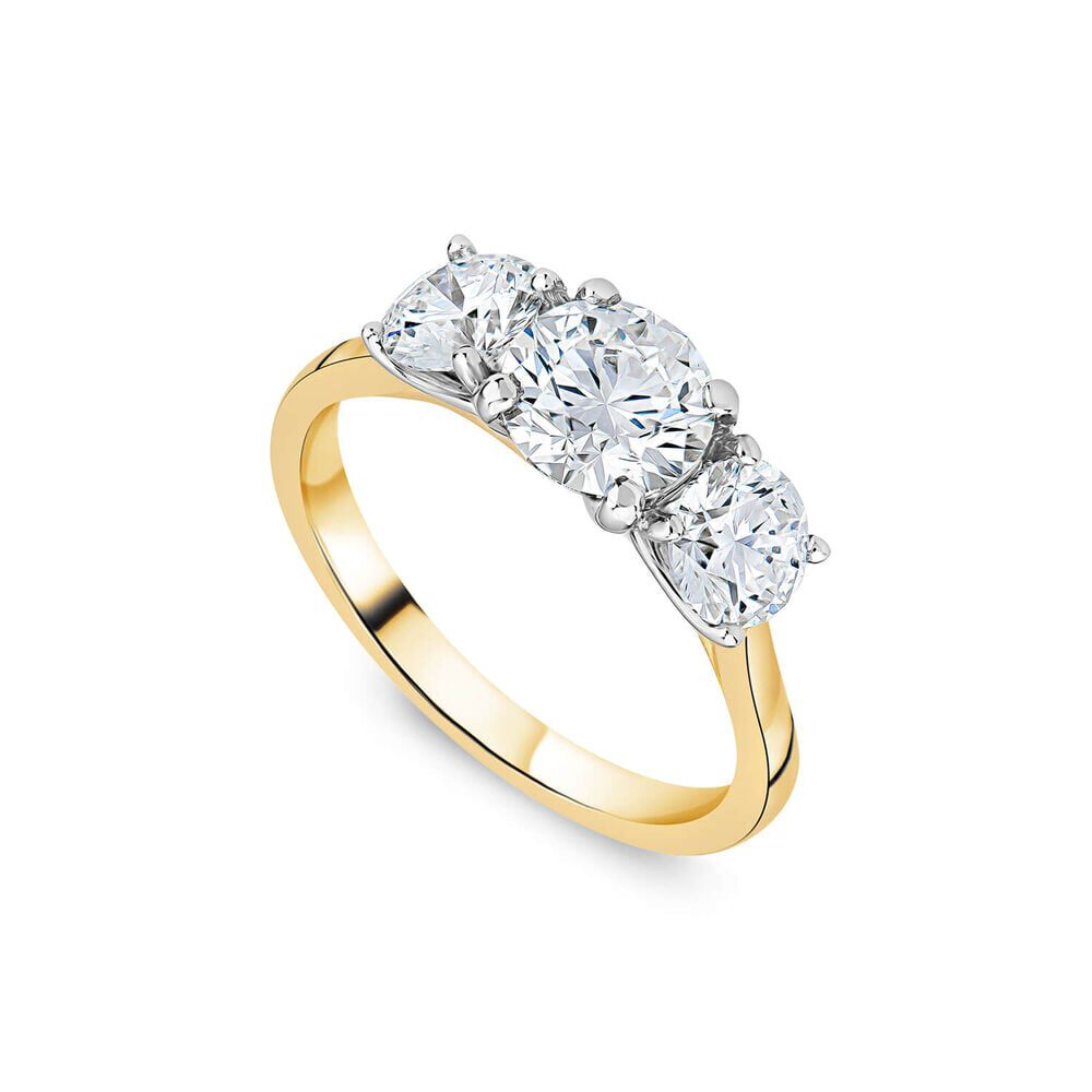 18ct yellow gold engagement ring featuring a trio of round brilliant-cut diamonds in a three-stone setting