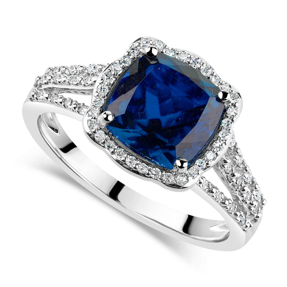 9ct White Gold 0.15ct Diamond and Created Sapphire Halo Ring image number 0