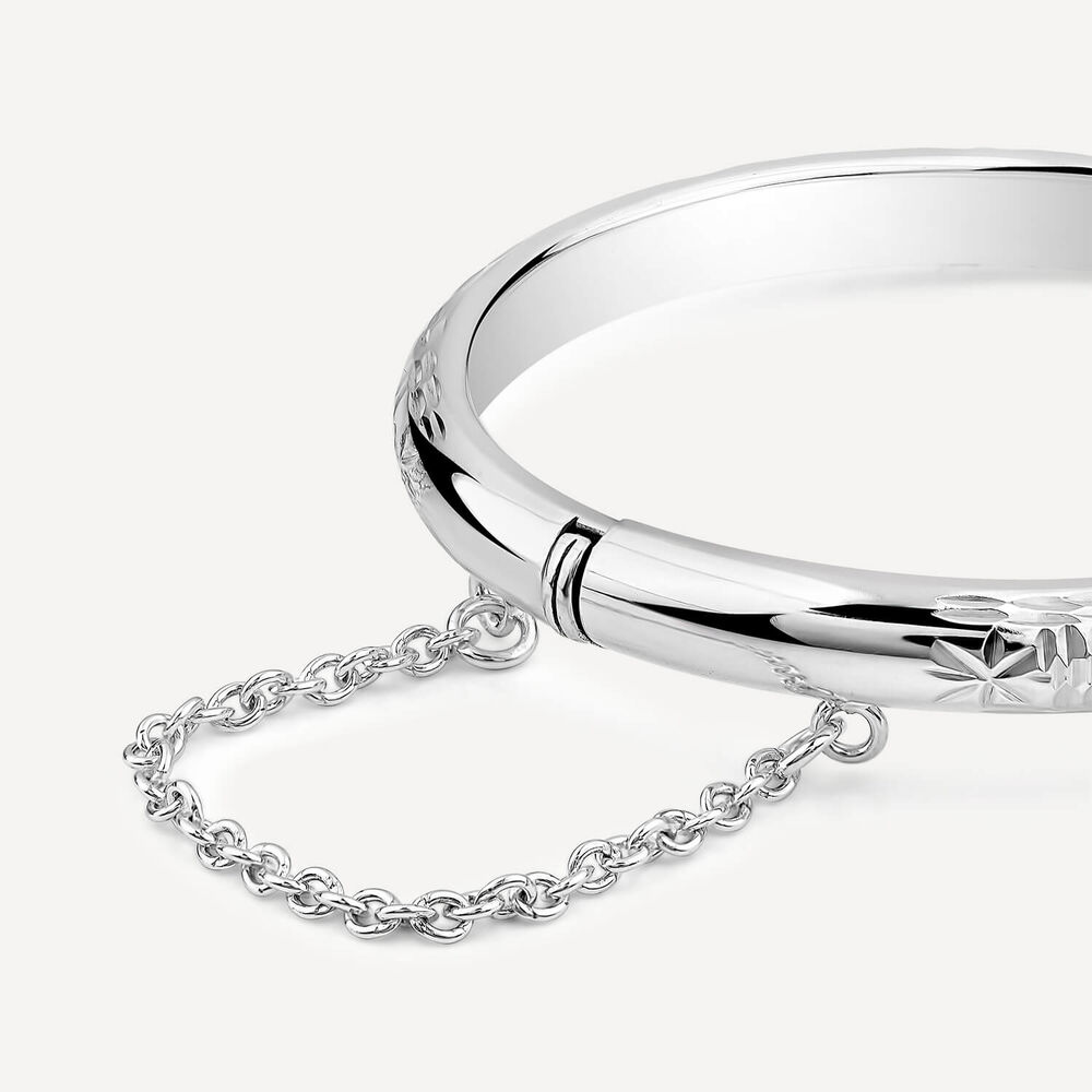 Sterling Silver Lines & Flower Engraved Safety Chain Baby Bangle image number 1
