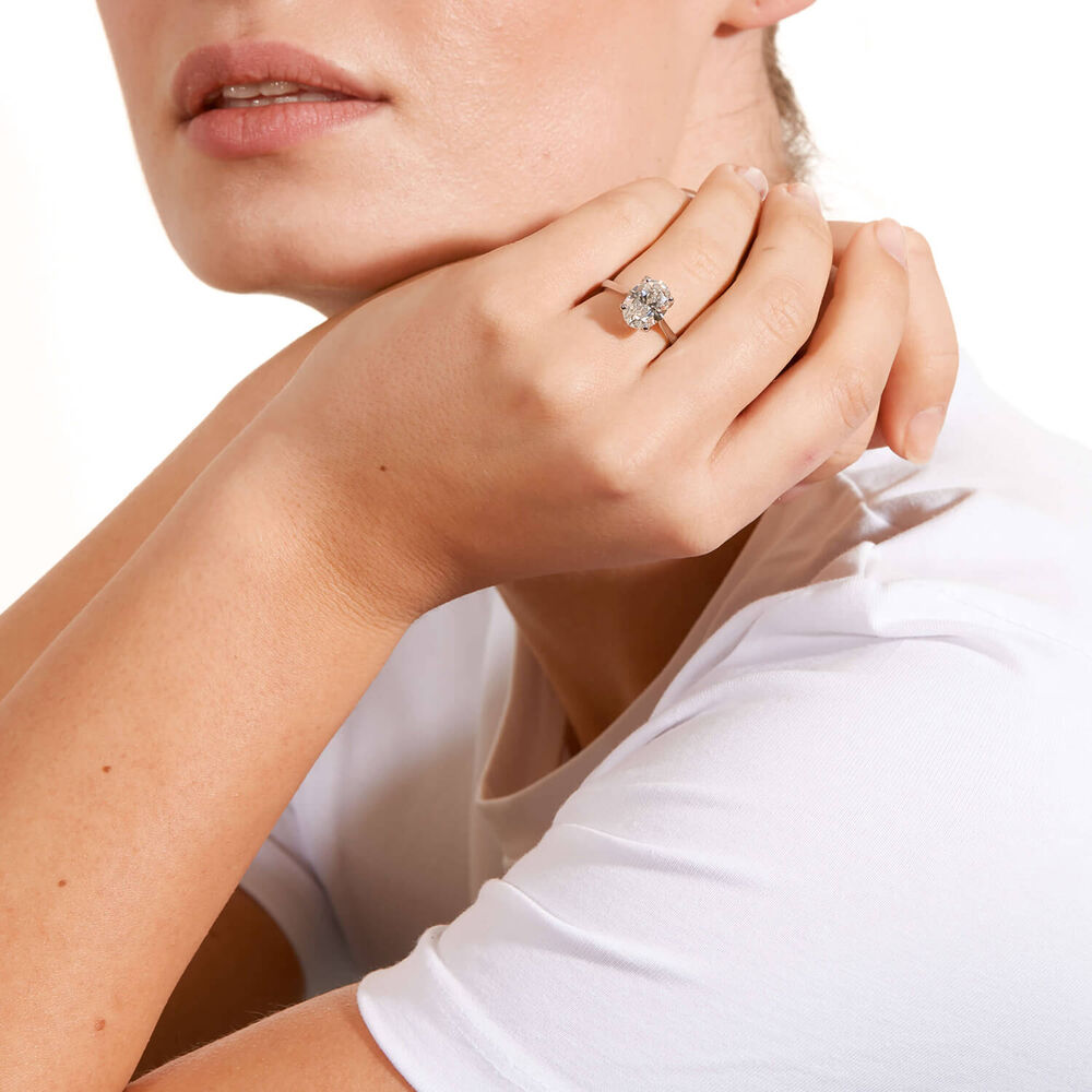 Born platinum 3.14ct oval lab-grown diamond solitaire ring styled on hand image number 3