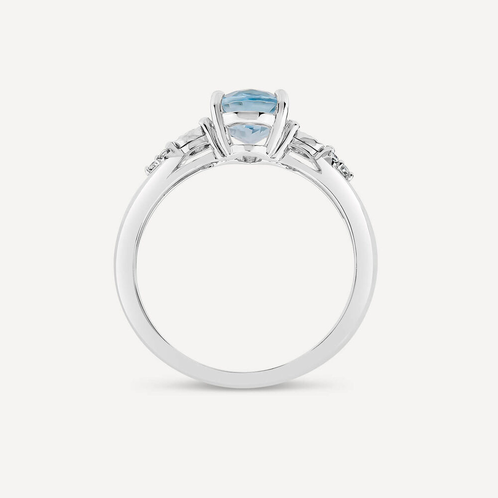 9ct White Gold Oval Blue Topaz Centre 0.14ct Diamond Trefoil Sides Ring image number 3