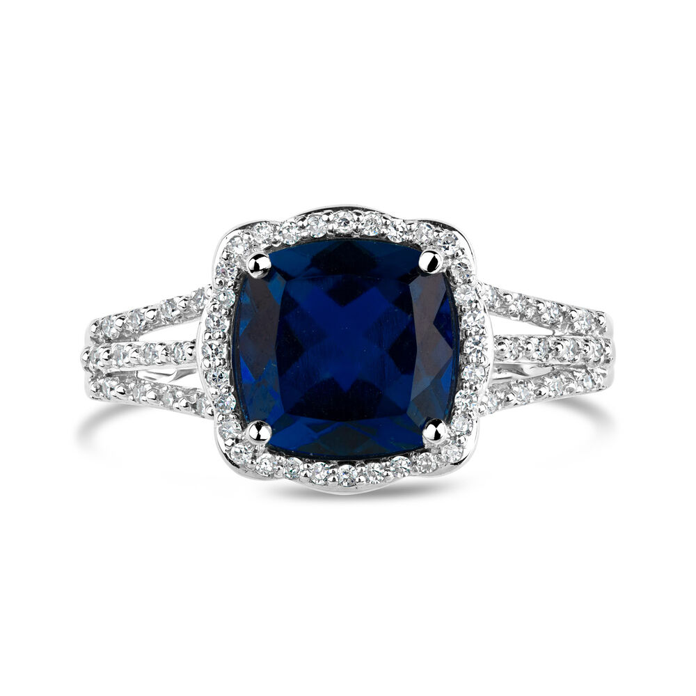 9ct White Gold 0.15ct Diamond and Created Sapphire Halo Ring