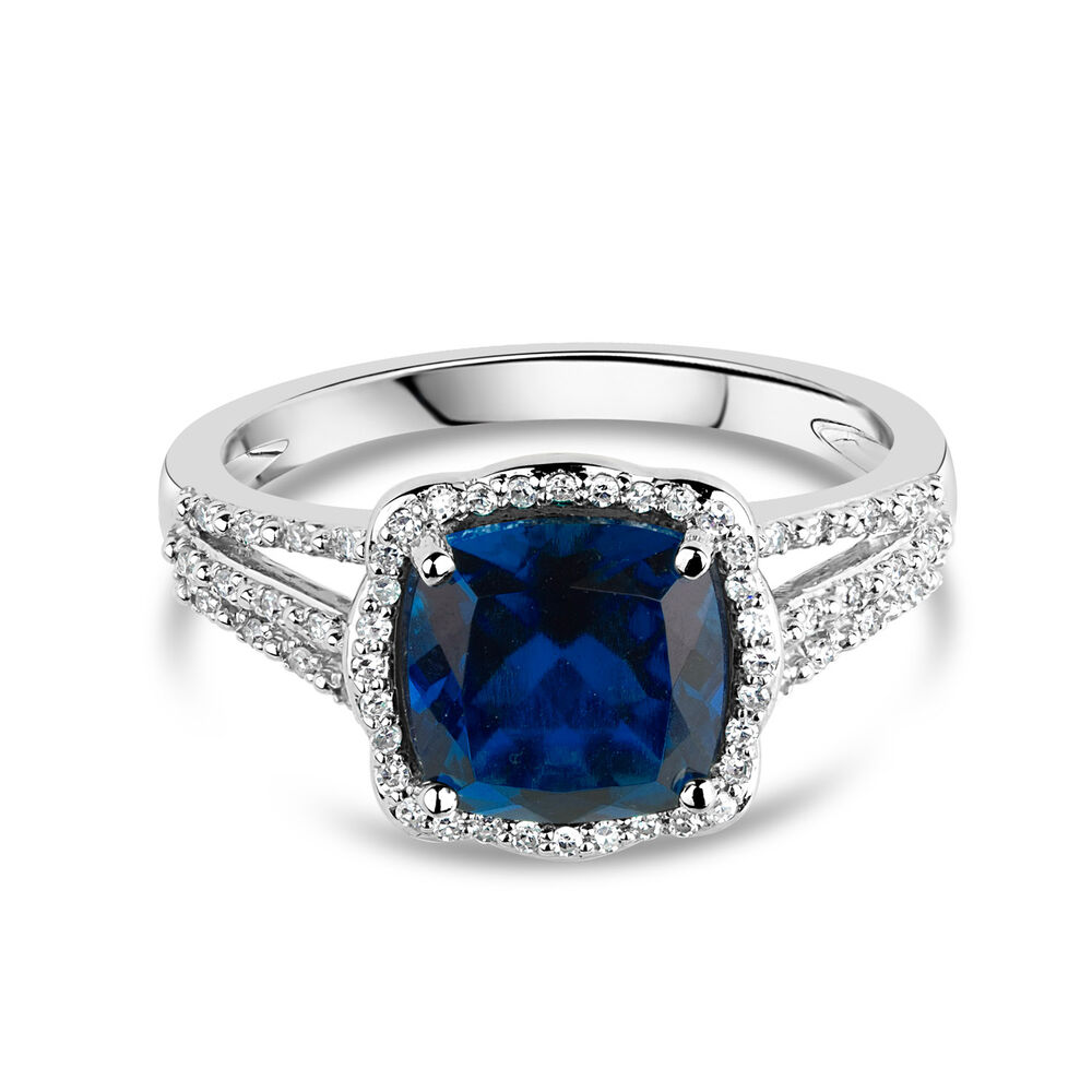 9ct White Gold 0.15ct Diamond and Created Sapphire Halo Ring image number 7