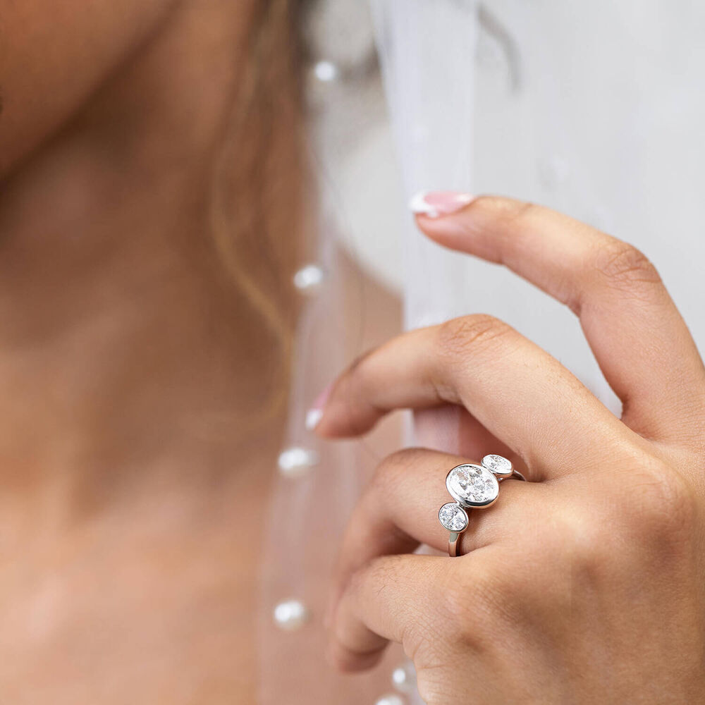 Born Platinum Lab Grown 2.80ct Oval Diamond Three Stone Bezel Set Ring