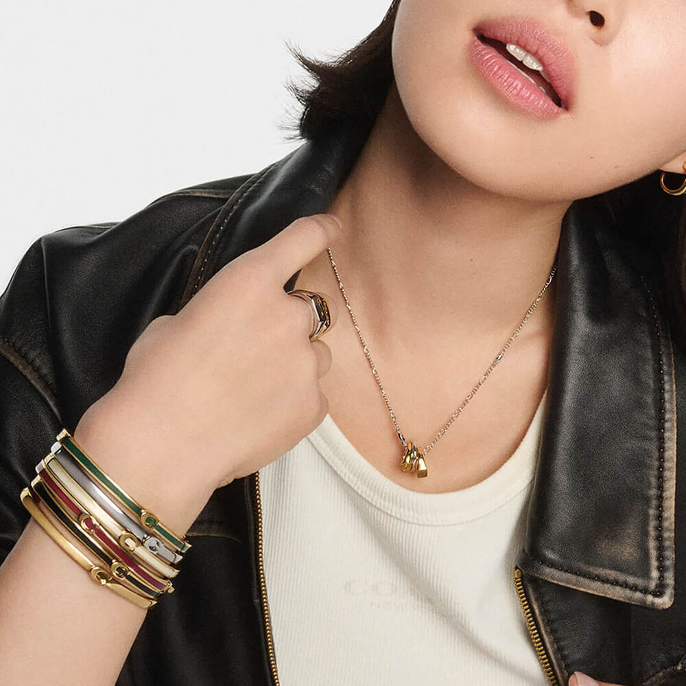 Coach Signature C Gold Tone Brass White Enamel Bangle Bracelet