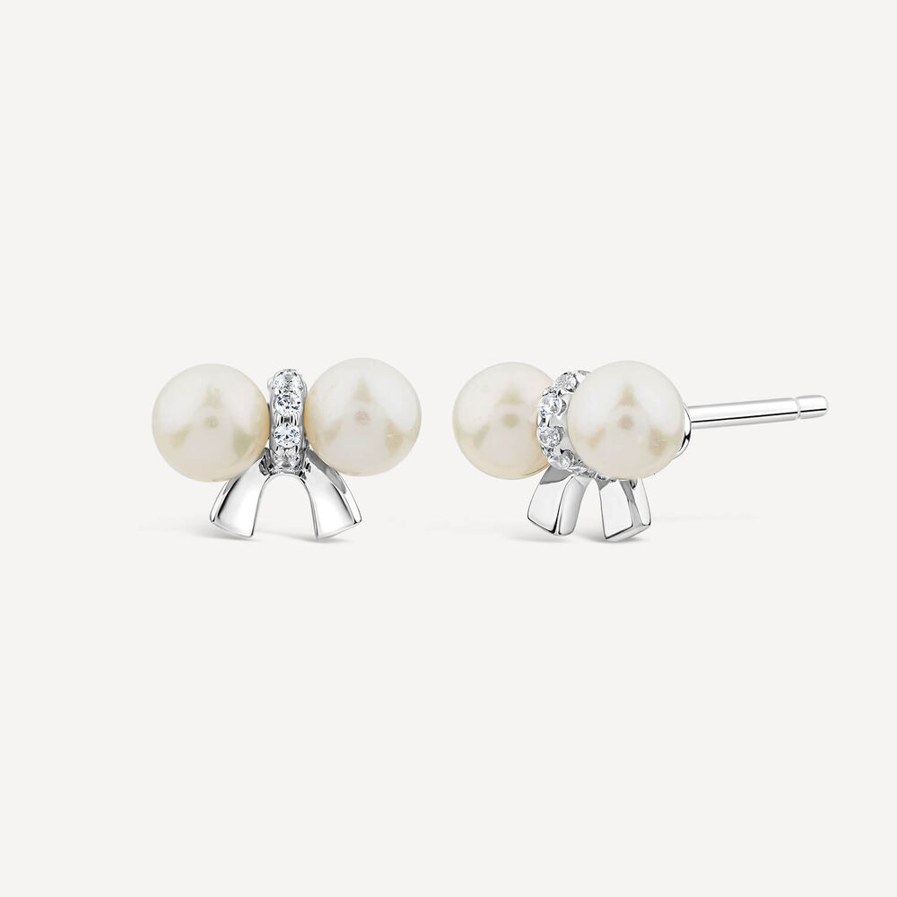 Sterling Silver Freshwater Pearl & Cubic Zirconia Bow Earrings image number 1