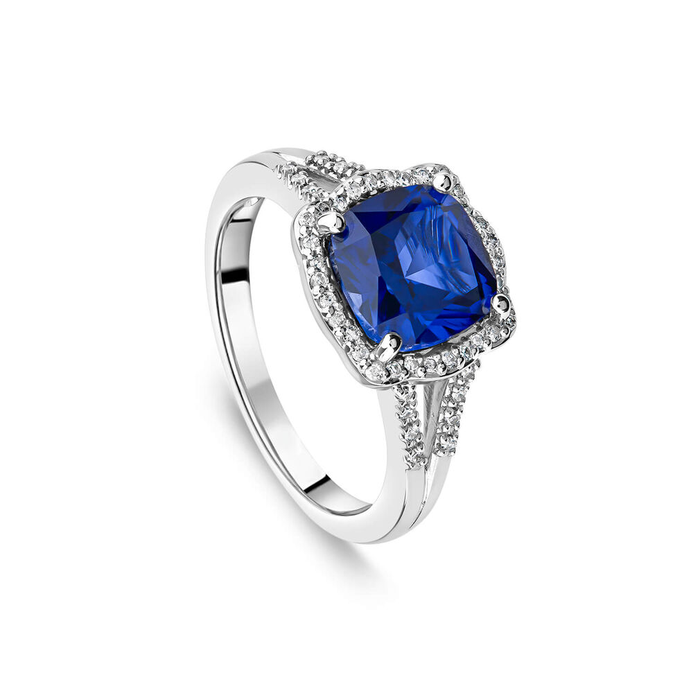 9ct White Gold 0.15ct Diamond and Created Sapphire Halo Ring
