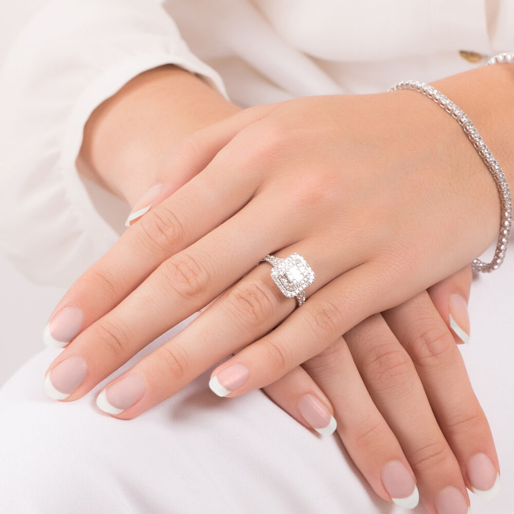 18ct White Gold 1.00 Carat Baguette and Round Brilliant Diamond Halo Cluster Ring image number 4