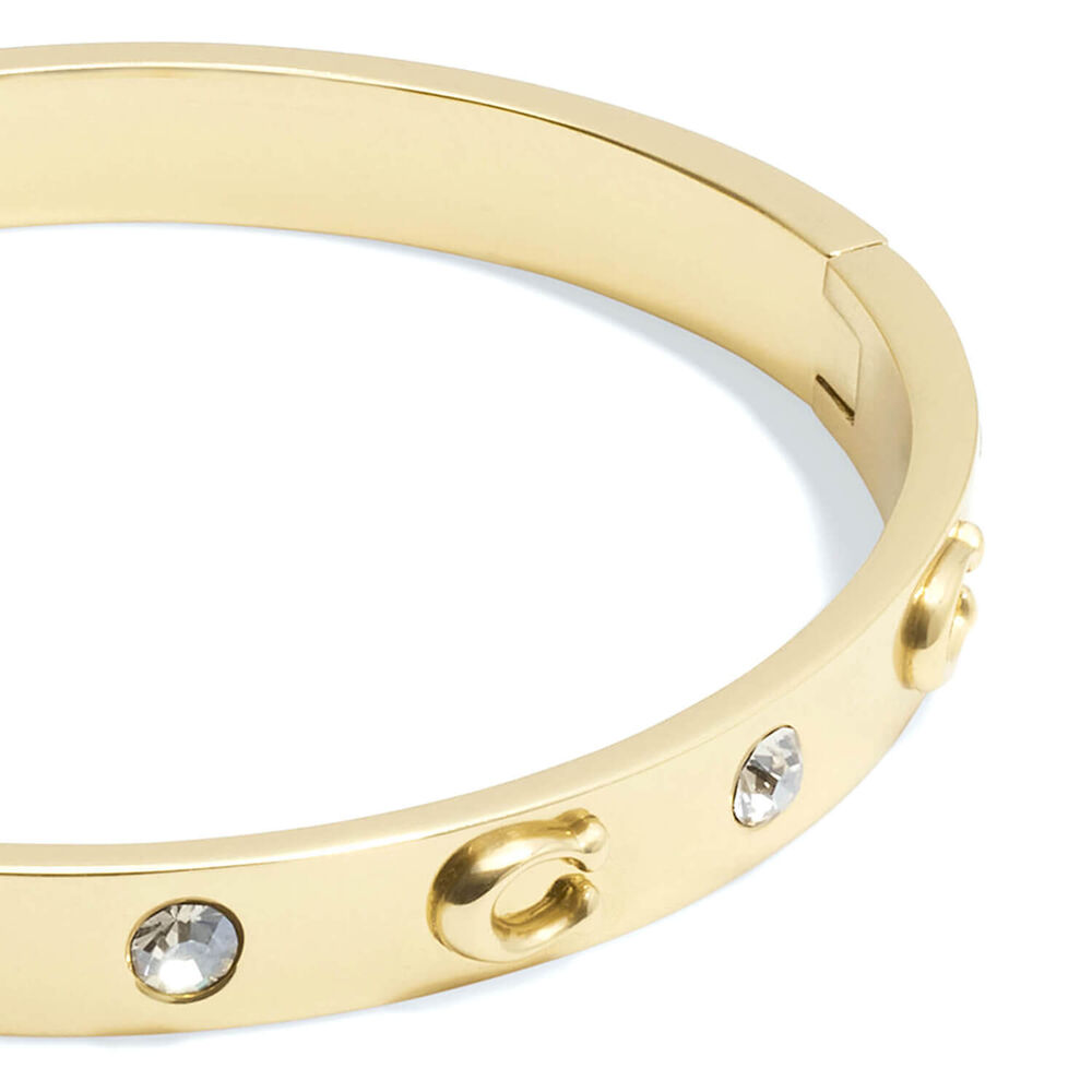 Coach Signature Gold Tone Brass Stone Bangle Bracelet