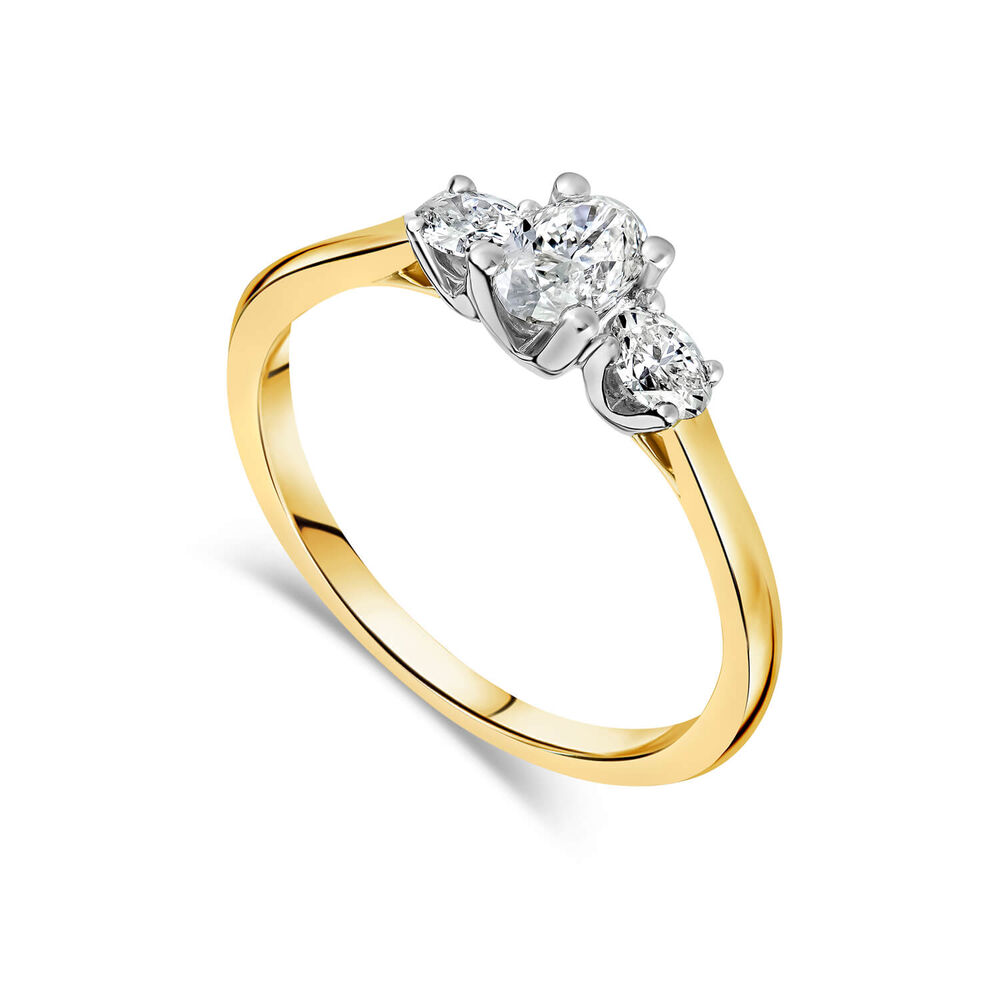 18ct Yellow Gold Three Stone Oval Centered 0.66 Carat Diamond Ring image number 0