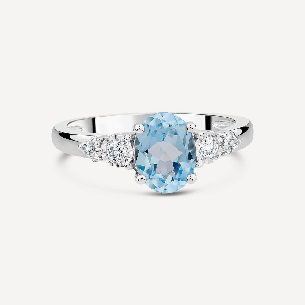 9ct White Gold Oval Blue Topaz Centre 0.14ct Diamond Trefoil Sides Ring image number 2