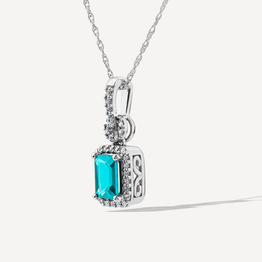 9ct White Gold Rectangular Blue Topaz & 0.10ct Diamond Halo Pendant image number 5