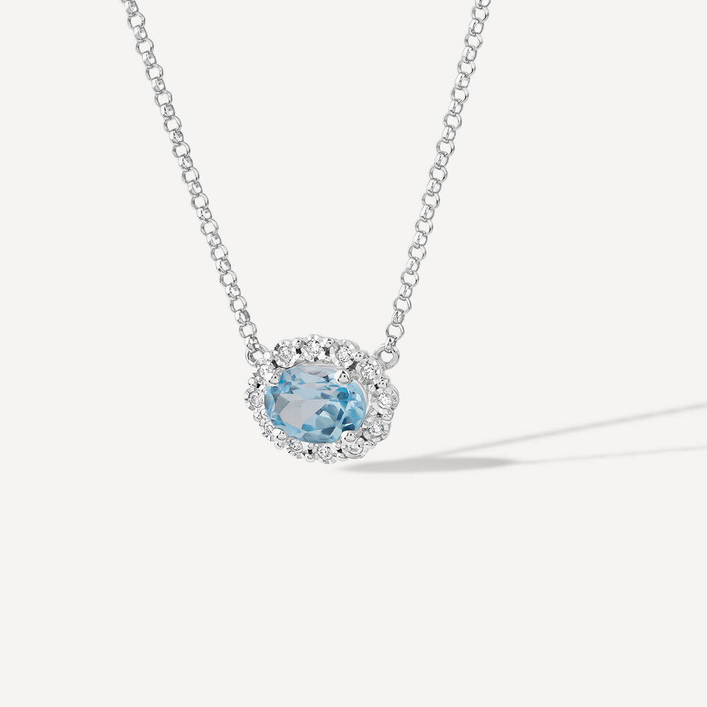 9ct White Gold Oval Blue Topaz 0.05ct Diamond Halo Necklet
